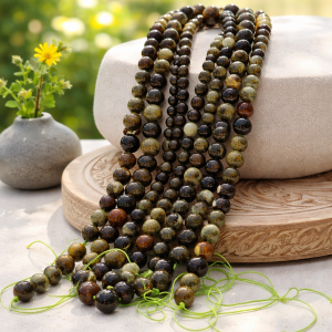 Fil de perles grenat vert